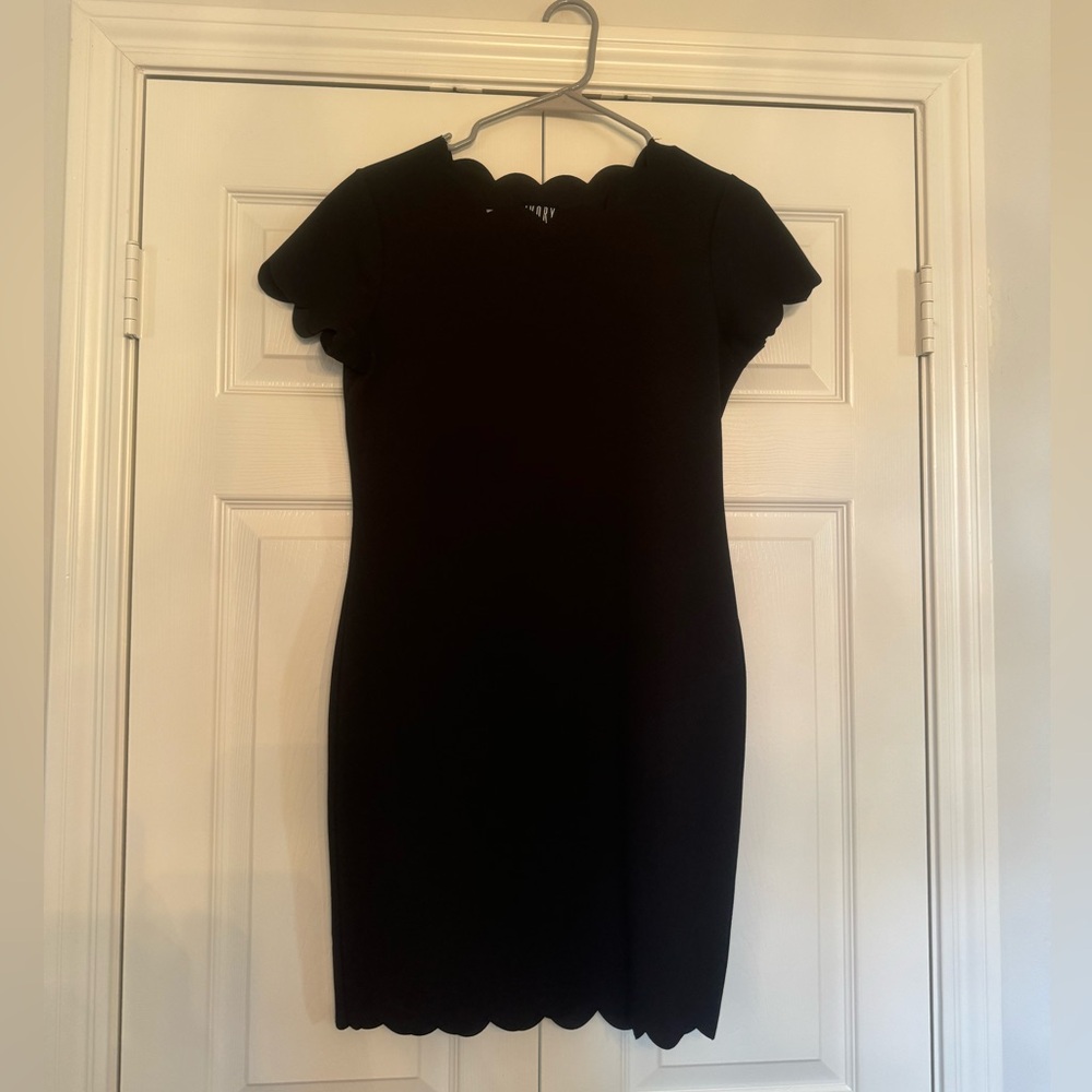 Short sleeve black dress with scalloped detail